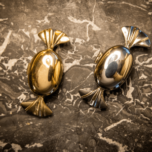 Brass storage pot for ear plugs