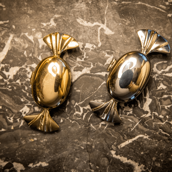 Brass storage pot for ear plugs