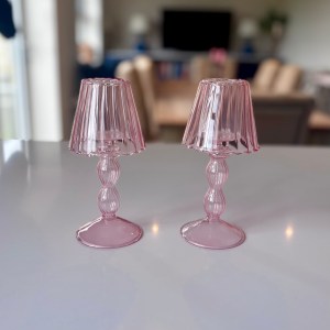 Pair of pink glass tea light lamps