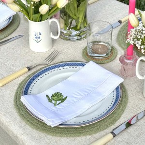 lifestyle shot of an embroidered napkin