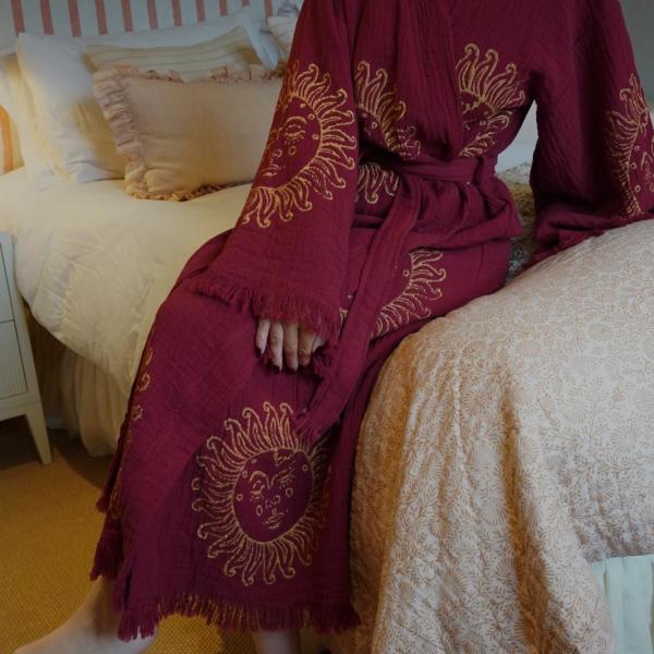 Make a statement with our limited-edition Merlot Burgundy Gold Sun Long Cotton Kimono Robe, exclusive to Loome Lifestyle. Handmade from 100% organic Turkish cotton, this lightweight yet luxurious kimono features our bestselling hand block-printed gold sun motif.