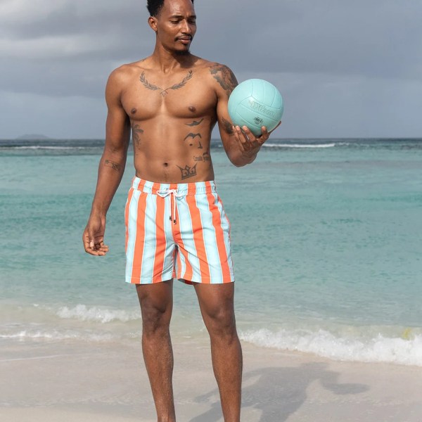 Men's Swim shorts in broad striped orange and turqoise. Light weight, fast drying. Outer shell 100% recycled. Soft mesh lining